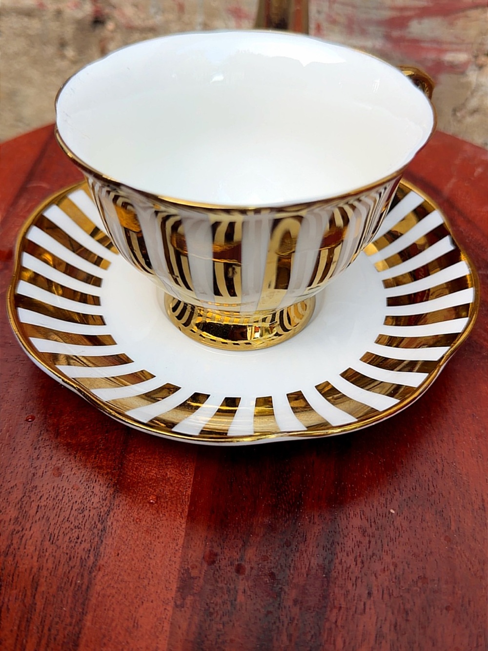 Elegant White and Gold Porcelain Teacup & Saucer Set